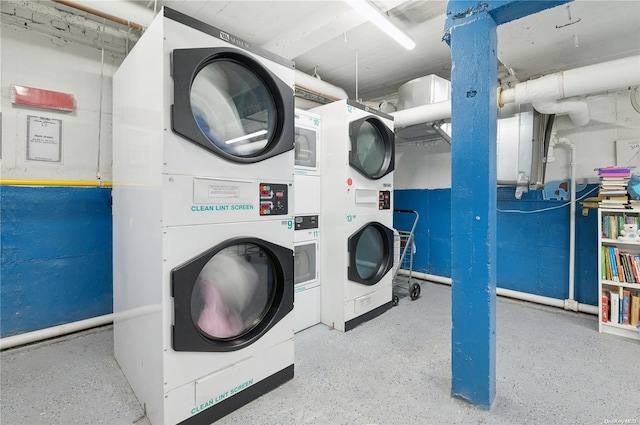 washroom with independent washer and dryer and stacked washing maching and dryer