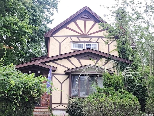 view of tudor-style house