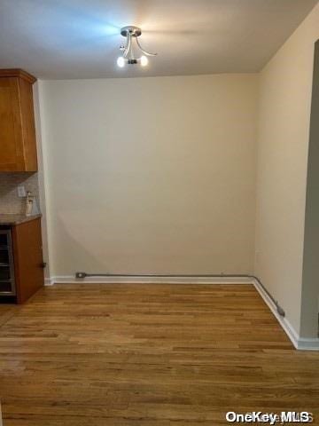 unfurnished dining area featuring light hardwood / wood-style floors