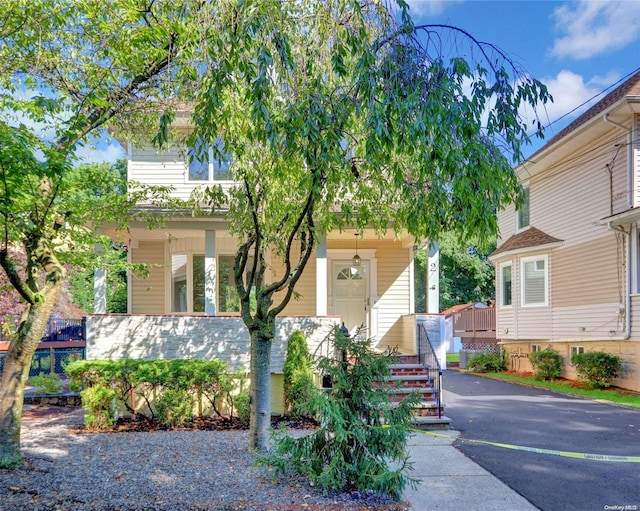 2 Oak Ct, Staten Island, NY 10308 - view of front of house with covered porch and stairs