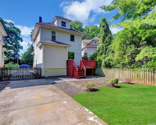 2 Oak Ct, Staten Island, NY 10308 - back of house with a deck and a chimney