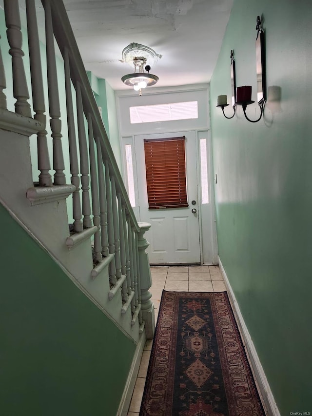 view of tiled foyer entrance