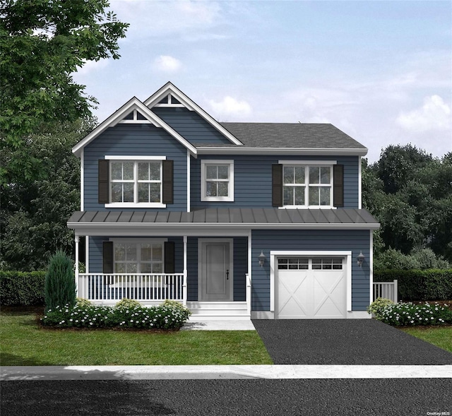 view of front facade featuring a front yard and a garage