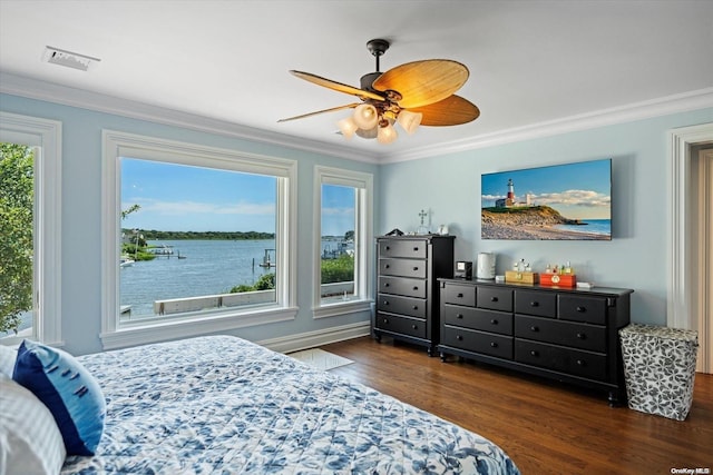 bedroom with ceiling fan, dark hardwood / wood-style flooring, and crown molding