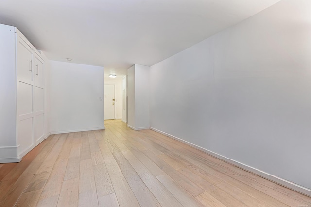 unfurnished room featuring light hardwood / wood-style floors