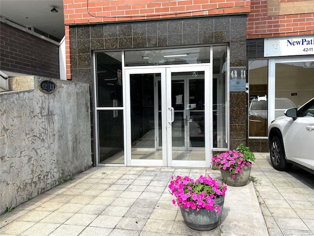 doorway to property featuring french doors