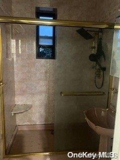 bathroom with walk in shower