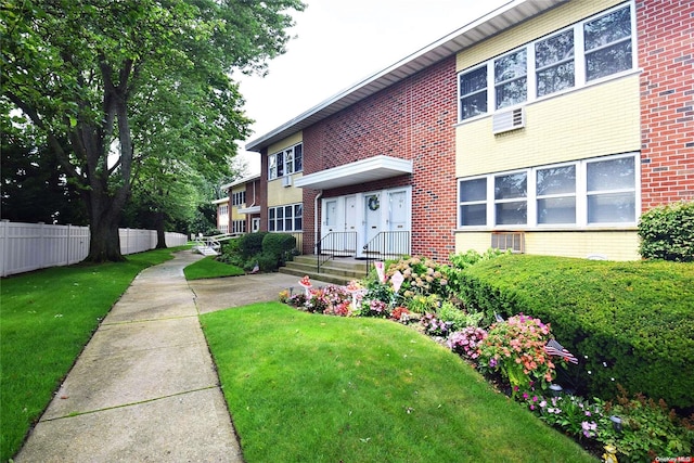 exterior space featuring a front lawn