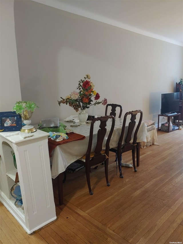 dining space featuring light hardwood / wood-style floors