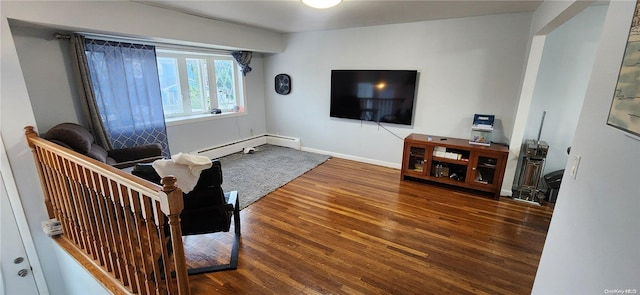 living room featuring hardwood / wood-style floors and baseboard heating