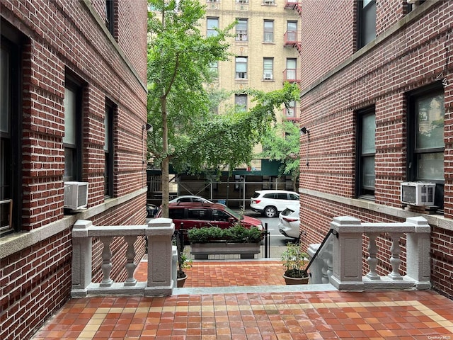 view of patio / terrace featuring cooling unit