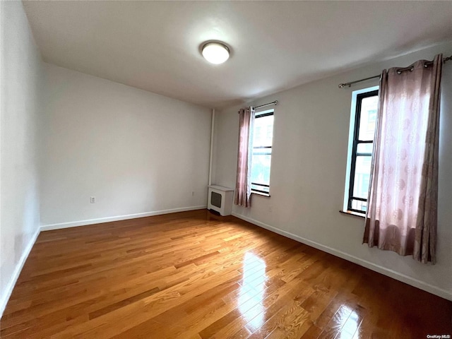 spare room featuring light wood-type flooring