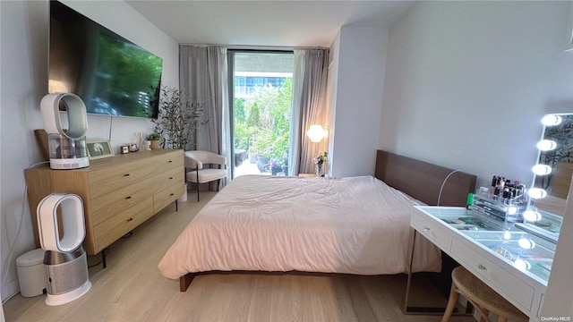 bedroom featuring light hardwood / wood-style floors