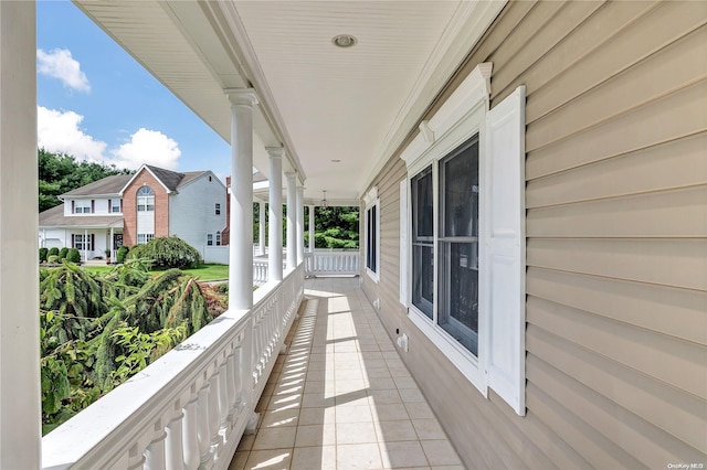 balcony featuring a porch