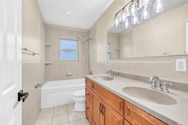 full bathroom with toilet, vanity, tile patterned floors, and tile walls