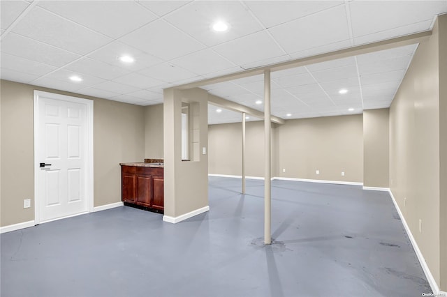 basement with a drop ceiling