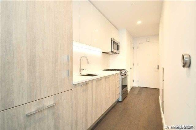 kitchen featuring sink and appliances with stainless steel finishes