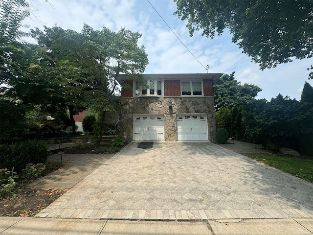 view of front of property featuring a garage