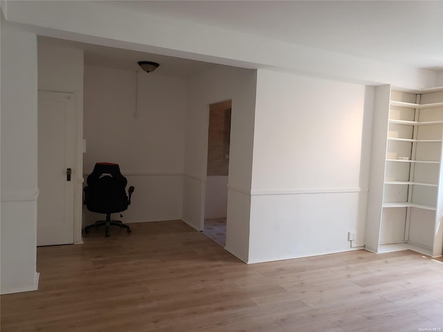 unfurnished room featuring light hardwood / wood-style floors