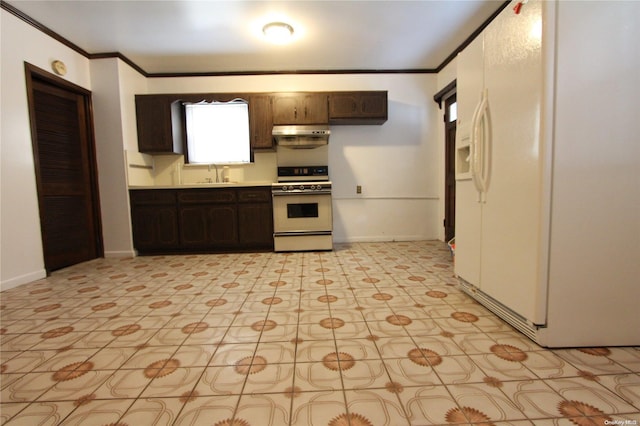 kitchen featuring dark brown cabinets, white appliances, sink, and ornamental molding