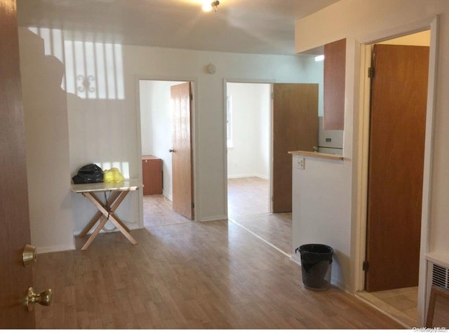 empty room with light wood-type flooring