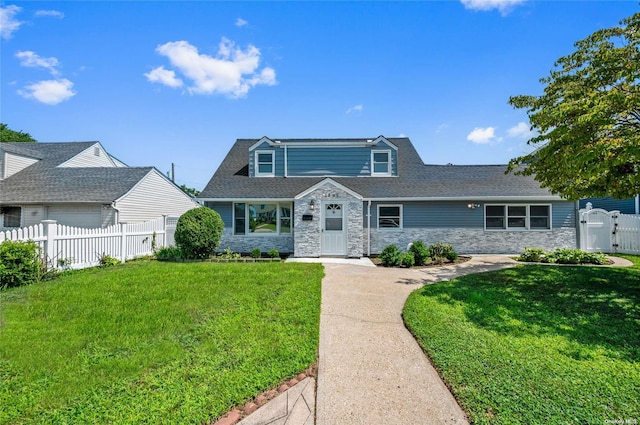 view of front of home featuring a front lawn