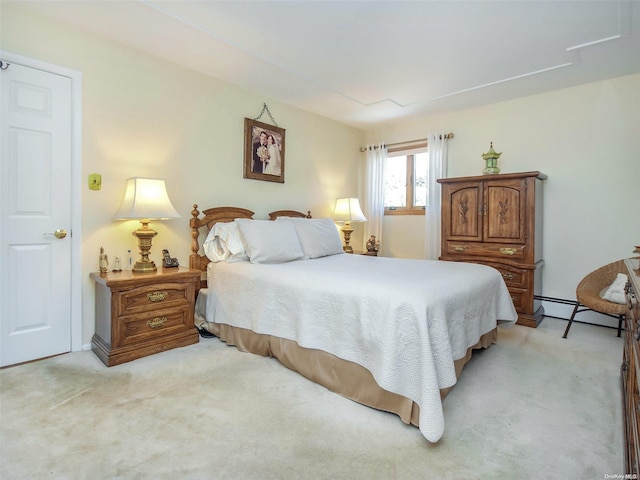 carpeted bedroom with baseboard heating