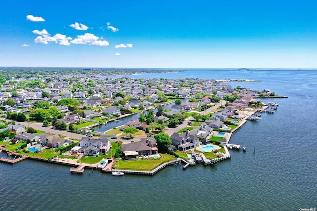 bird's eye view with a water view and a residential view