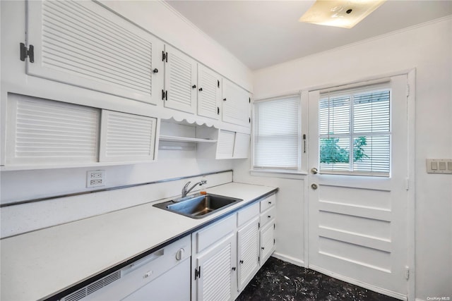 kitchen with dishwasher, crown molding, sink, and white cabinets