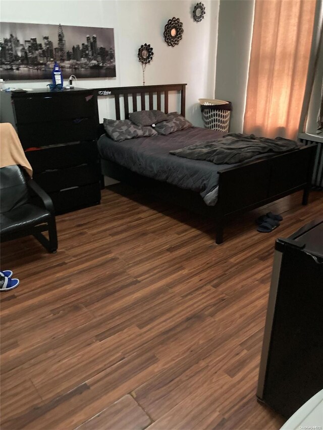 bedroom featuring wood-type flooring