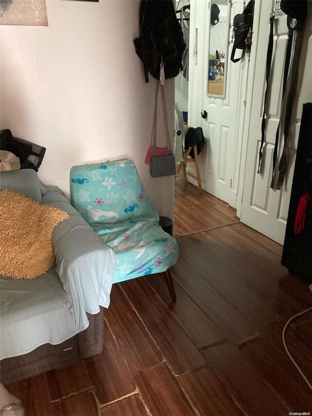 mudroom with dark hardwood / wood-style flooring