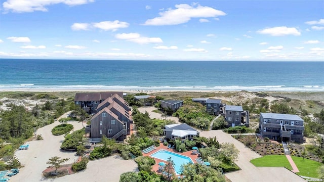 aerial view with a view of the beach and a water view