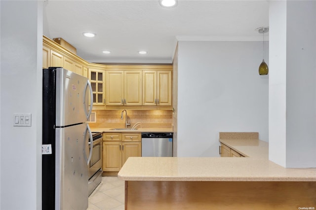 kitchen featuring sink, stainless steel appliances, kitchen peninsula, crown molding, and light brown cabinetry