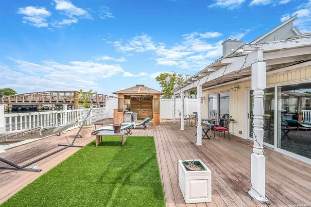 view of yard with a wooden deck