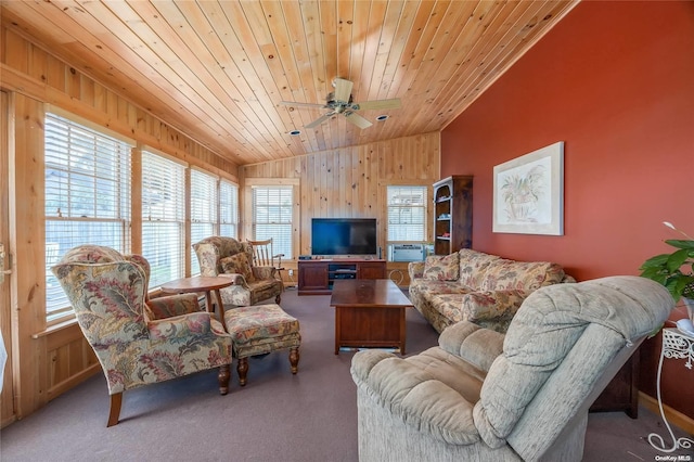 carpeted living room featuring wood ceiling, vaulted ceiling, cooling unit, ceiling fan, and wood walls