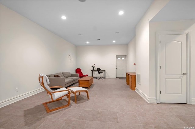 sitting room featuring light tile patterned floors