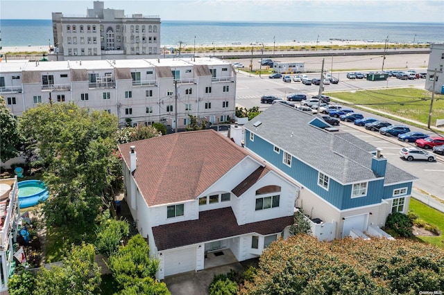 drone / aerial view with a water view