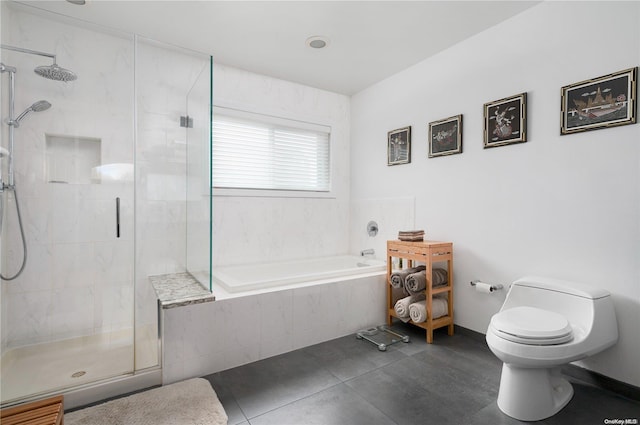 bathroom with plus walk in shower, tile patterned floors, and toilet