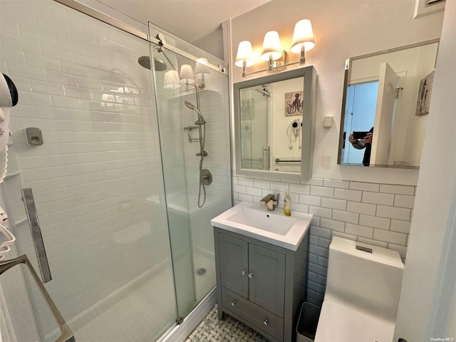 61-20 Grand Central Pkwy Unit B401, Forest Hills, NY 11375 - bathroom with vanity, a shower with door, and tile walls