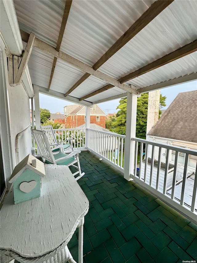 balcony featuring a porch