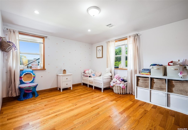 bedroom featuring light wood-type flooring