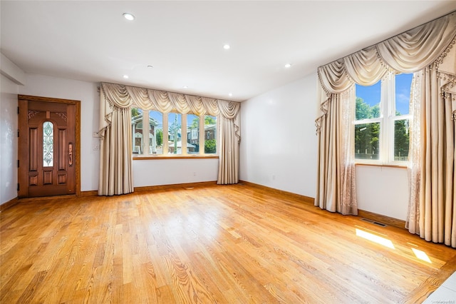 interior space with plenty of natural light and light wood-type flooring