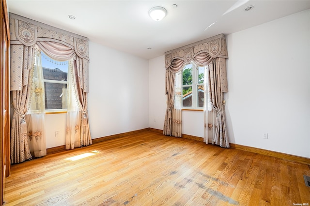 empty room featuring light hardwood / wood-style flooring