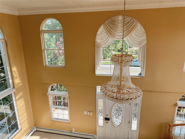 details with ornamental molding, a baseboard radiator, and a notable chandelier