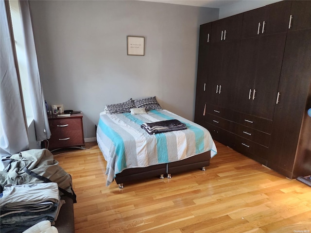 bedroom featuring light hardwood / wood-style floors