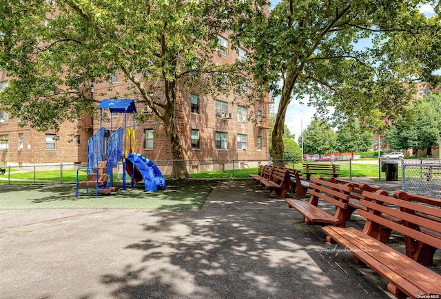 view of home's community with a playground