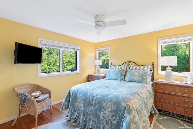 bedroom featuring ceiling fan and hardwood / wood-style floors