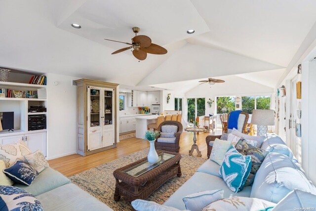 216 Broadway, Saltaire, NY 11706 - living room with ceiling fan, light wood-style flooring, recessed lighting, and high vaulted ceiling