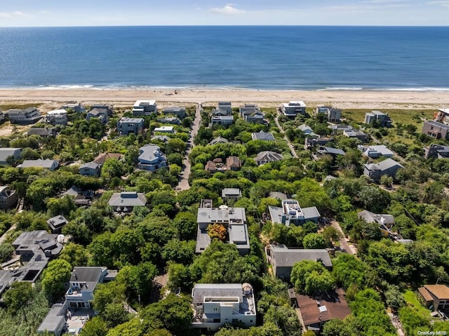 aerial view featuring a water view and a view of the beach