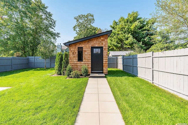 216 N St, Greenport, NY 11944 - view of outdoor structure featuring a fenced backyard